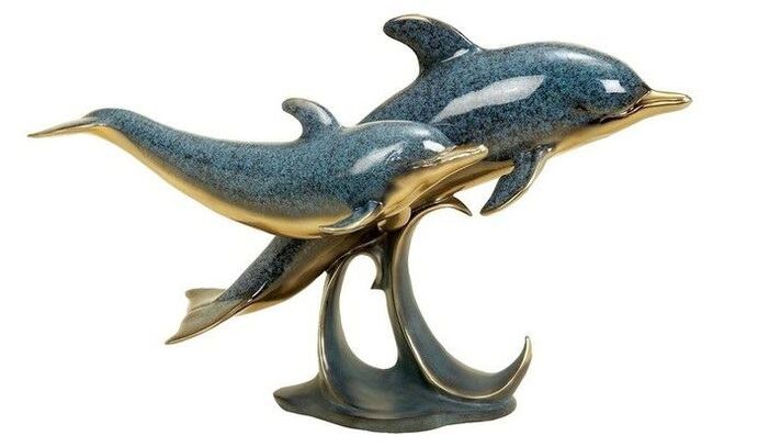 delfinai meilės amuleto pavidalu